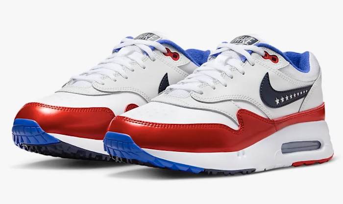 Side view of red, white, and blue Nike Air Max golf shoes.